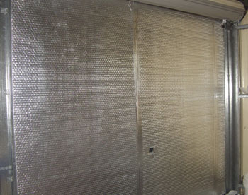 panel lift garage door insulation